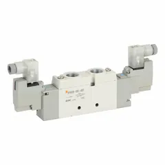 This SMC SY9000 series valve is a double solenoid, five-way/two-position directional control valve with 5 ports and 24V DC operation. It features a terminal block connection, internal pilot, non-locking manual override, and solenoid return. Used to direct compressed air in automated machinery and industrial pneumatics systems.