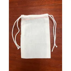 This cotton/poly blend drawstring bag measures 5 inches in length and 3 inches in width, with a fabric weight of 3.98 oz/sq yd. It features a double-drawstring closure and is sold in packs of 100. Suitable for packaging small parts, hardware, or promotional items in retail display or industrial kitting applications.