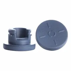 Synthetic rubber stopper made of bromobutyl, in gray. Stopper size 20 with 19 mm top diameter, 13.27 mm bottom diameter, and 11.8 mm overall height. Complies with EP 2.9.19 standards. Used for sealing pharmaceutical vials and laboratory containers requiring low gas permeability and chemical resistance.