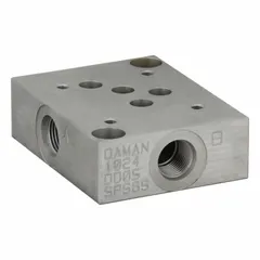 Ductile iron valve subplate for D05 NFPA size directional control valves. Side-port configuration with 4 in overall height. Used in hydraulic systems to mount valves in industrial and mobile equipment.