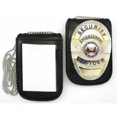 This black leather badge holder accommodates standard identification badges. It is suited for use in industrial, corporate, and facility settings where personnel require quick badge access. The holder features a durable leather construction.