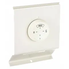 Mechanical selector dial thermostat for electric baseboard heaters. Single-pole, 120/277V AC, with a control range of 40° to 100°F. White housing, unit mount design for direct installation on the heater.
