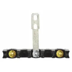 This terminal block is a replacement part for ovens and ranges, used to connect power supply wires to heating elements and controls. It provides a secure electrical connection for appliance operation.