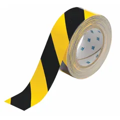 This striped black/yellow polyester tape is designed for marking floors in industrial environments. With a thickness of 8 mil and dimensions of 2 inches by 100 feet, it provides visible aisle, hazard, and work zone delineation without a printed message legend.