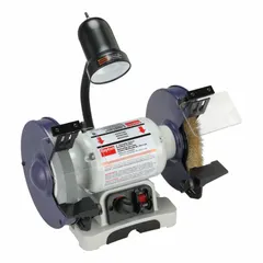 This Dayton bench grinder features a variable-speed motor with a range of 2,000 to 3,450 RPM, allowing adjustment for different grinding tasks. It has a 1/2 hp motor, accepts wheels up to 8 inches in diameter, and operates on 120V AC. The integrated task light improves visibility during precision work. Typical applications include sharpening, deburring, and shaping metal parts in maintenance and fabrication settings.