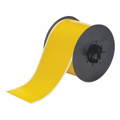 Continuous label roll measuring 3 in x 100 ft, made of yellow gloss vinyl for outdoor use. Compatible with Brady S3100 printer series for thermal transfer printing. Suitable for industrial labeling applications such as asset identification, safety signage, and pipe marking.
