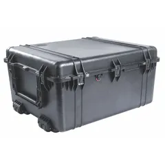 This PELICAN case is a standard protective transport case with interior dimensions of 25 1/8 in x 30 1/8 in x 15 3/8 in. It features a folding handle, double-throw closures, and four wheels for mobility. The case is black and rated IP67 for dust and water immersion protection. It is supplied without foam, allowing custom padding for sensitive equipment.