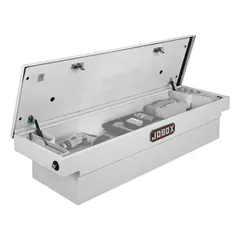 This single-lid crossover box is constructed from steel with a white finish. It has an overall width of 71 inches and is designed for mounting across a pickup truck bed to provide secure, weather-resistant storage for tools and equipment.