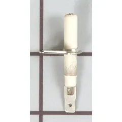 This spark electrode generates the ignition spark for burner lighting in compatible Whirlpool ovens. It is a replacement part used during oven maintenance and repair to restore proper ignition function.