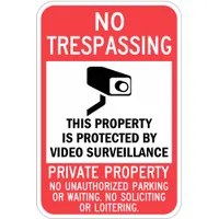 Aluminum sign with mounting holes for permanent installation. Engineer Grade retroreflective sheeting provides nighttime visibility. Displays a multi-line notice covering video surveillance, private property, unauthorized parking, and solicitation. Suitable for mounting on walls, fences, or posts