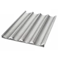 This aluminum baguette and French bread pan features four slots to shape and support dough during proofing and baking. It is suited for commercial bakeries and foodservice operations producing artisan bread. The pan measures 17 3/4 inches wide by 1 inch deep and is finished in silver
