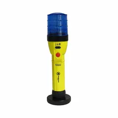 Battery-powered flashing light with blue lens, producing 140 flashes per minute. Overall dimensions 11-1/2 in length by 3 in width. Equipped with a magnet mounting mechanism for attachment to ferrous surfaces. Suitable for use as a portable visual warning signal in industrial, construction, and maintenance settings.
