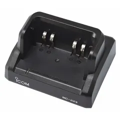 Single unit charger for Icom R30 series handheld radios. Accepts 12 to 16 V DC input and charges one radio at a time. Suitable for use in communication equipment maintenance and field operations.