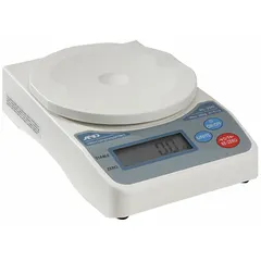 Compact bench scale with 0.44 lb capacity and 0.1 g readability. Weighing surface depth is 5 1/8 in. Displays in grams and imperial units. ABS plastic housing. Suitable for general weighing tasks such as shipping, parcel checking, and light industrial counting.