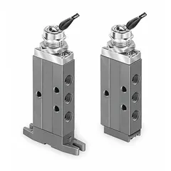 Four-way, two-position, spring-return spool valve with toggle actuator. Aluminum body with 1/8 in female NPT ports. Used for manual directional control of compressed air in pneumatic systems.