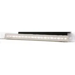 Clear rectangular LED backup/reverse light with 15 3/8 in overall height. Features wire leads for electrical connection and IP67 rating for dust and water resistance. Meets SAE J593C standards. Designed for permanent installation on vehicles and equipment to provide illumination when reversing.