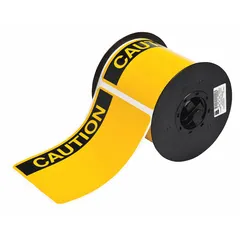 White vinyl precut label roll with CAUTION header, measuring 4 in x 6 in. Acrylic adhesive for indoor/outdoor use. Compatible with BBP31 printer series for on-demand safety signage on equipment, walls, or barriers.