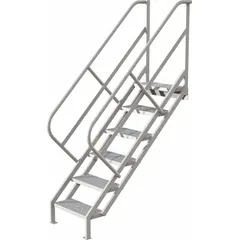 These steel stairs feature a perforated design with 6 steps and a load capacity of 450 lb. The gray finish provides a clean appearance. Suitable for providing elevated access in industrial and warehouse settings.