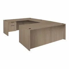 Double pedestal desk with particle board frame and desktop in Oak finish, Noble Oak frame color. Includes one pedestal with two drawers and a modesty panel. Suitable for office or workspace use, providing a surface for computer work, writing, and document organization.