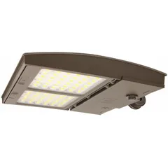This 100W LED fixture delivers 14,300 to 14,900 lumens at 5000K color temperature. It operates on 120-277V AC input and features a bronze finish. Designed for street and parking lot lighting, it supports arm, slipfitter, knuckle, surface, yoke, or trunnion mounting.