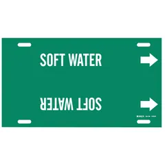 Strap-on pipe marker for identifying soft water lines. Green background with white legend and directional arrows. Fits pipe outer diameters of 10 to 15 inches. Suitable for use in industrial piping systems where clear identification of soft water flow is required.