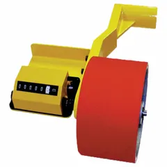 This hard surface measuring machine is designed for measuring lengths of hard materials such as metal, plastic, or rubber. It features a 3602 counter oriented towards the operator and displays measurements in meters, with a maximum length capacity of 99,999.9 meters.