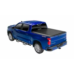 Roll-up tonneau cover made of black vinyl with bolt-on mounting. Measures 85 1/2 inches in length and 6 inches in width. Designed to cover and protect pickup truck beds from weather and debris.