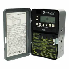 Surface-mount digital timer switch with metal body for indoor use. Features 7-day astronomic scheduling and DPST/SPST switching. Automates lighting control based on sunrise and sunset times for energy-efficient operation.