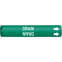 This snap-on pipe marker identifies drain lines on pipes with outer diameters from 1-1/2 to 2-3/8 inches. The green background with white legend and directional arrows provides clear indication of flow direction. Suitable for use in industrial facilities for pipe identification and labeling