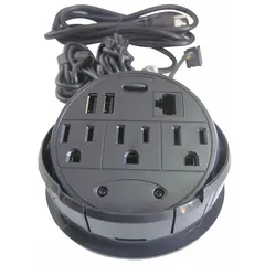 This round furniture power strip features a black finish and recessed mounting for flush integration into desks, tables, and workstations. It provides three AC outlets and one Type A USB charging port, with an 8 ft cord for flexible placement. The unit measures 4.22 inches in width.