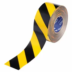 Black/yellow striped floor marking tape with 22 mil thickness and polyester backing. Used for marking aisles, hazard zones, and traffic lanes in industrial facilities to improve workplace safety and organize workflow.