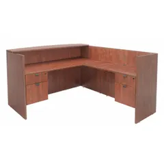 This L-shaped reception desk from REGENCY features a cherry melamine finish. With an overall height of 42 inches and width of 71 inches, it provides a spacious work surface suitable for front-office and lobby areas in commercial and industrial settings.
