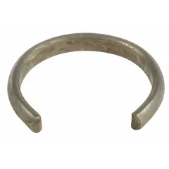 Socket ret ring for pneumatic tools, used to secure sockets on drive spindles. Replacement part for maintaining tool operation in assembly and repair tasks.
