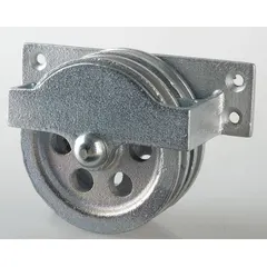 This side-mount double pulley block is designed for pulling operations in material handling and rigging applications. It features a steel housing and steel sheave, with a bolt-on, upright mount and sleeve configuration. Suitable for lifting and pulling tasks in industrial settings.