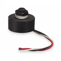 This photocell automatically switches lighting on and off based on ambient light levels. Designed for use in hazardous locations, it operates at 208-277V and has a length of 1 3/4 inches