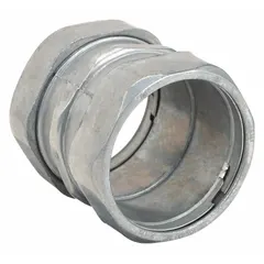 This compression conduit coupling connects two lengths of EMT conduit in electrical raceway systems, providing a secure and grounded joint. Made of zinc with a plain finish, it has a 3 in trade size and 3 9/16 in overall length in gray. CSA certified.