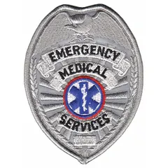Sew-on embroidered badge with gold design on a plastic base. Measures 2 1/2 inches by 3 1/2 inches. Suitable for uniform identification, bags, or display in emergency medical services contexts.