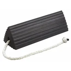 This CHECKERS RC5521-S is a single black rubber aircraft wheel chock measuring 20-1/2 inches long, 5-1/4 inches wide, and 5-1/4 inches high. It is used to secure parked aircraft and prevent unintended movement in aviation maintenance, ground support, and industrial safety applications.
