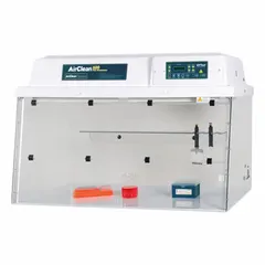 Fully assembled PCR enclosure with clear panels for visibility. Includes base/stand and work surface; no blower required. Designed to provide a low-turbulence workspace for polymerase chain reaction procedures in laboratory settings.