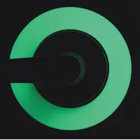 This circle-shaped floor marking tape is solid green with no legend, measuring 5 1/2 inches in diameter. The tape is 66 mil thick and made of vinyl backing material. It is used to mark locations such as door positions or designated areas on floors in industrial and commercial settings