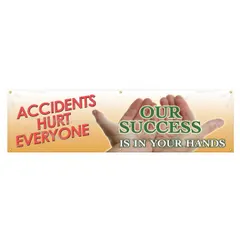 Indoor/outdoor banner made of poly sheeting, printed on one side with the message 'Accidents Hurt Everyone. Our Success Is In Your Hands'. Nominal sign size is 28 in x 96 in. Suitable for use in workplaces to communicate safety messages.