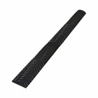 This black rubber rumble strip measures 3 5/16 ft long, 4 in wide, and 1/2 in high. Designed for installation on asphalt surfaces using spikes, the kit includes (8) 3 in spikes and all necessary hardware. Commonly used in parking lots, driveways, and industrial zones to alert drivers and reduce speed