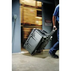 Standard protective transport case with interior dimensions of 24 x 23 3/4 inches. Includes convoluted, pick and pluck, and solid foam options for custom cushioning. Features an over-molded handle, latch closures, and four wheels for mobility. Suitable for safeguarding tools, electronics, or instruments during transport or field use.