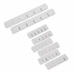 This drawer divider kit includes two long dividers and six short dividers for organizing contents within medical cart drawers. The dividers measure 9 inches in depth and 1/2 inch in width. Suitable for separating supplies and instruments to maintain an orderly workspace.