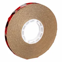 Permanent acrylic adhesive transfer tape on a kraft paper liner. Transparent and UV-resistant for applications requiring a thin bond line. Used in industrial assembly, graphics mounting, and splicing.