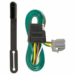 This 4-way flat electrical plug connects trailer lights (brake, turn, and tail) to a tow vehicle. It features an IP67 rating for dust and water resistance, a black powder-coated finish, and includes a dust cover. Suitable for towing and fleet applications where reliable electrical connections are required.