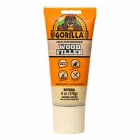 GORILLA Wood Filler in natural color, supplied in a 6 oz tube. This filler is paintable after drying and is used for filling gaps, cracks, and holes in wood surfaces for interior and exterior repair projects