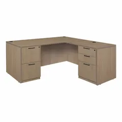 This double pedestal desk from REGENCY features a particle board frame in Noble Oak with an Oak desktop. It includes two pedestals with five drawers for storage and a modesty panel. Suitable for office environments, the desk measures 66 inches wide by 29 inches high.