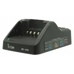 Single unit charger for ICOM M85 series radios and compatible models F3400D, F4400D, F52D, F62D, F7010, F7020, and F7040. Drop-in design for convenient battery recharging in communication equipment setups.