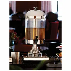 Polycarbonate juice dispenser with a 2.1-gallon capacity, round shape, and silver finish. Features a single dispenser unit for serving cold beverages in commercial foodservice settings such as cafeterias, buffets, and restaurants.